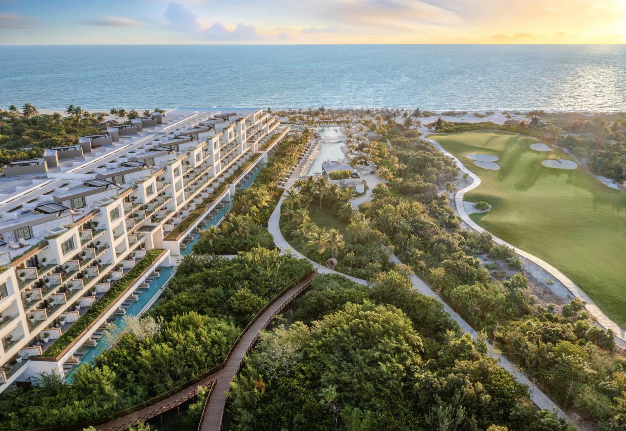 Hotel Atelier Playa Mujeres (Adults Only) Cancún Esterno foto Aerial view of the community