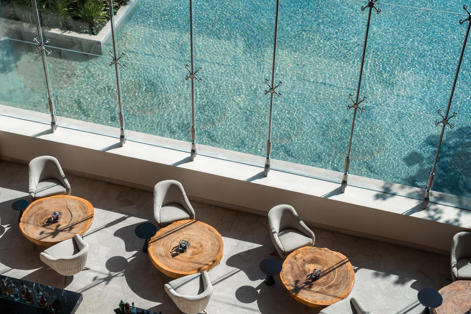 Hotel Atelier Playa Mujeres (Adults Only) Cancún Esterno foto The pool at the hotel